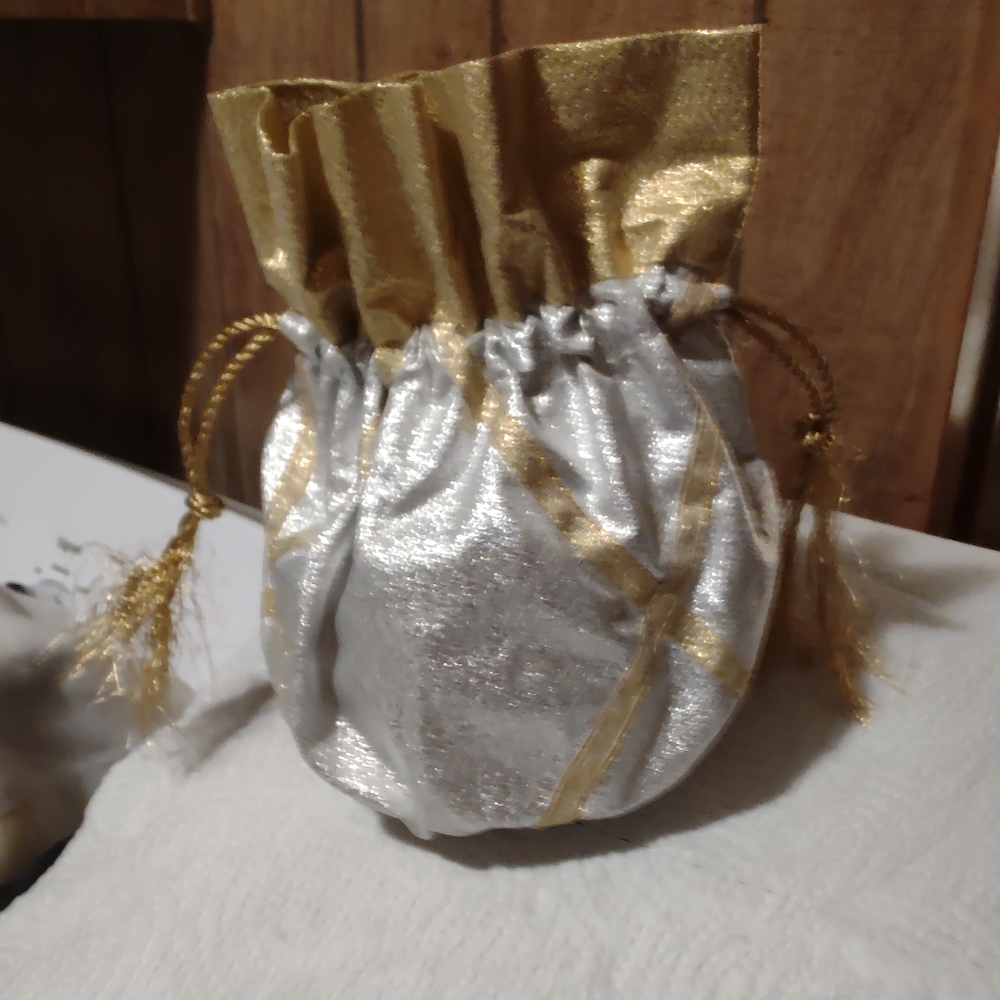 BRAND NEW!!! THREE DECORATIVE DRAW STRING POUCHES.